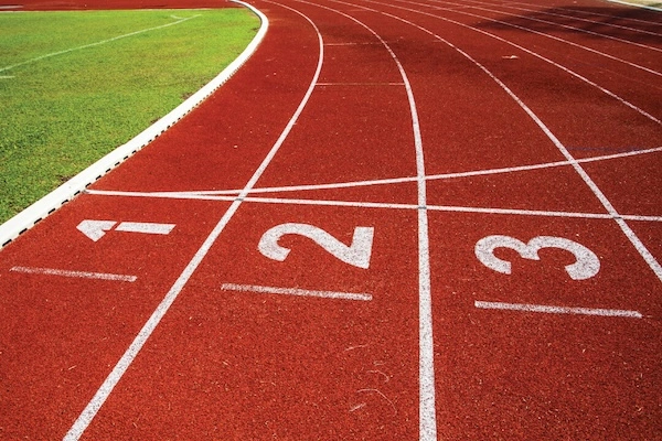 Red Running Track with White Guidelines and Markings.